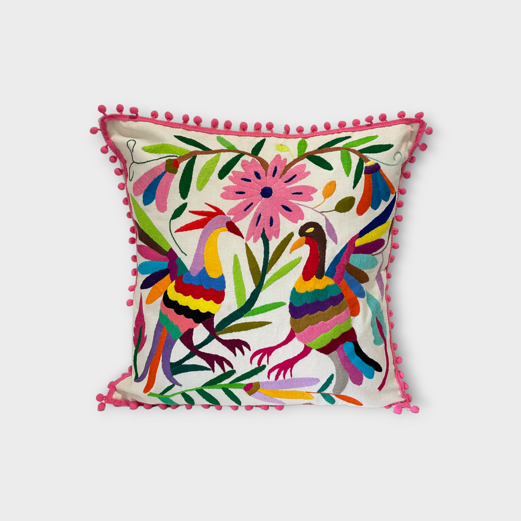 Otomi pillow cover with pink pompoms