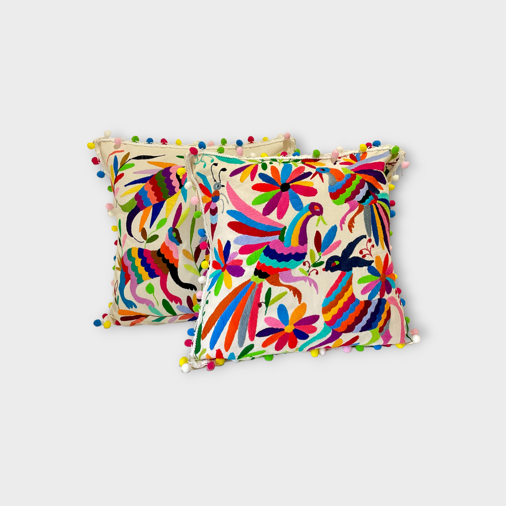 Otomi pillow cover with multicolor pompoms