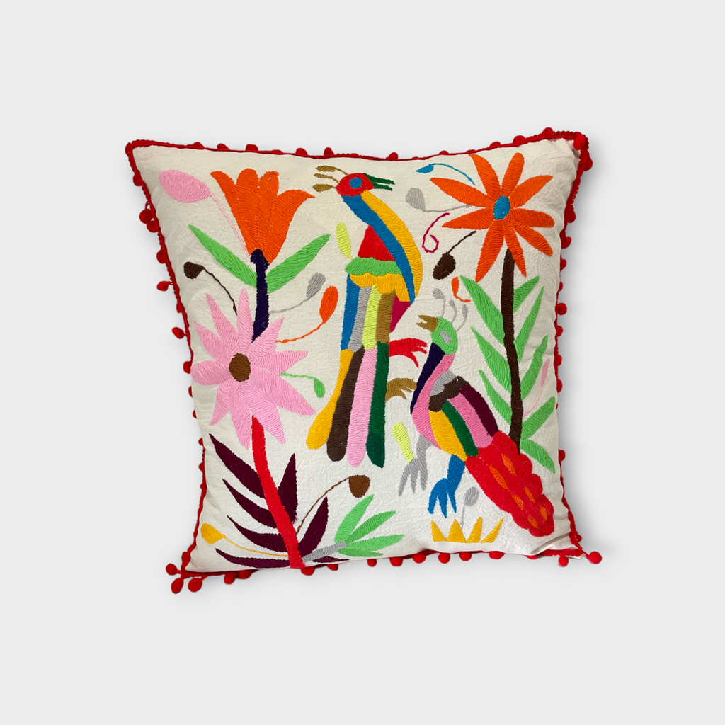 Otomi pillow cover with red pompoms